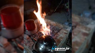 چای آتشی در اقامتگاه بوم گردی سیکان - دره شهر - روستای هاشم آباد
